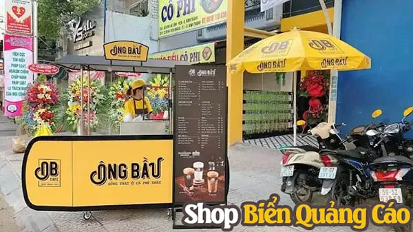 Bảng hiệu cà phê pha máy nổi bật với tông màu tối và chữ nổi đèn LED